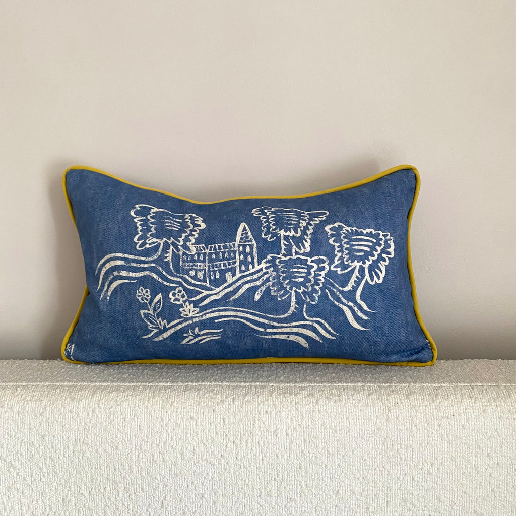 Friendly folk blue and yellow piped cushion